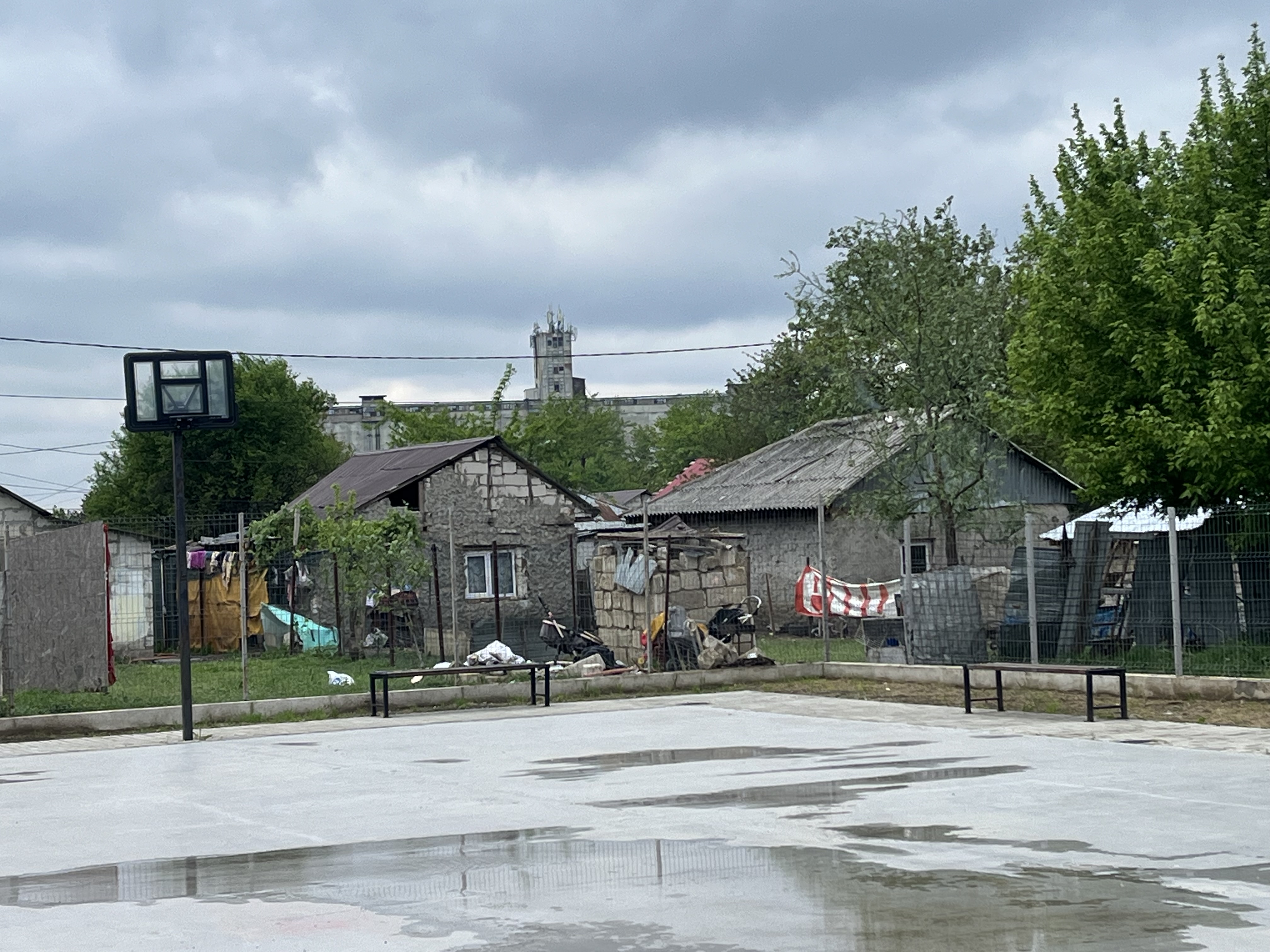 Basketball Court of the Commmunity Center in Oboru Nou neighbourhood, Călărași, Houses in the background, Călărași County, Romania, April 2024